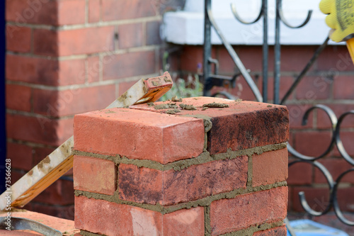 Bricklaying - spirit level on the wall