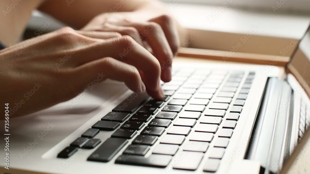 Woman's hands typing on computer keyboard (HD) Woman's hands typing on computer keyboard (HD)