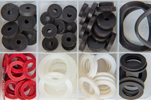 Different Rubber o-rings for water supply sorted in a box photo