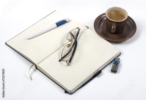 Notebook coffee and pen
