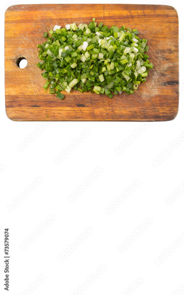 Spring onion or scallions on wooden cutting board Spring onion or scallions on wooden cutting board