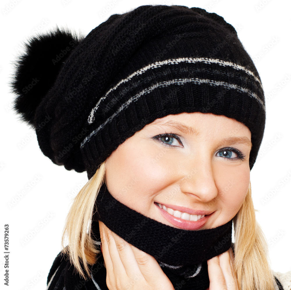 Cheerful woman clothing in warm hat. Winter season. Cheerful woman clothing in warm hat. Winter season.