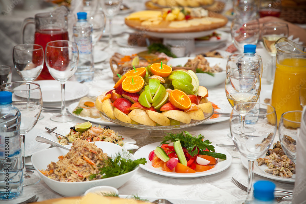fruits and salads on the holiday table in the restaurant