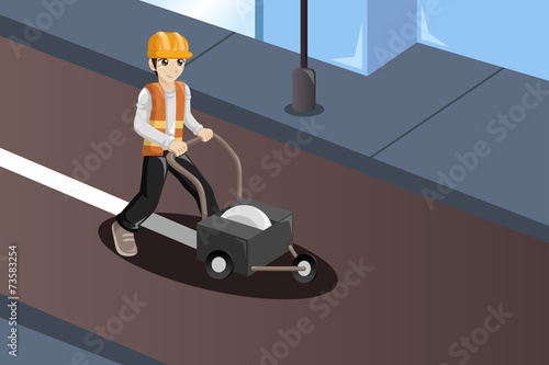 Road worker painting the road lines