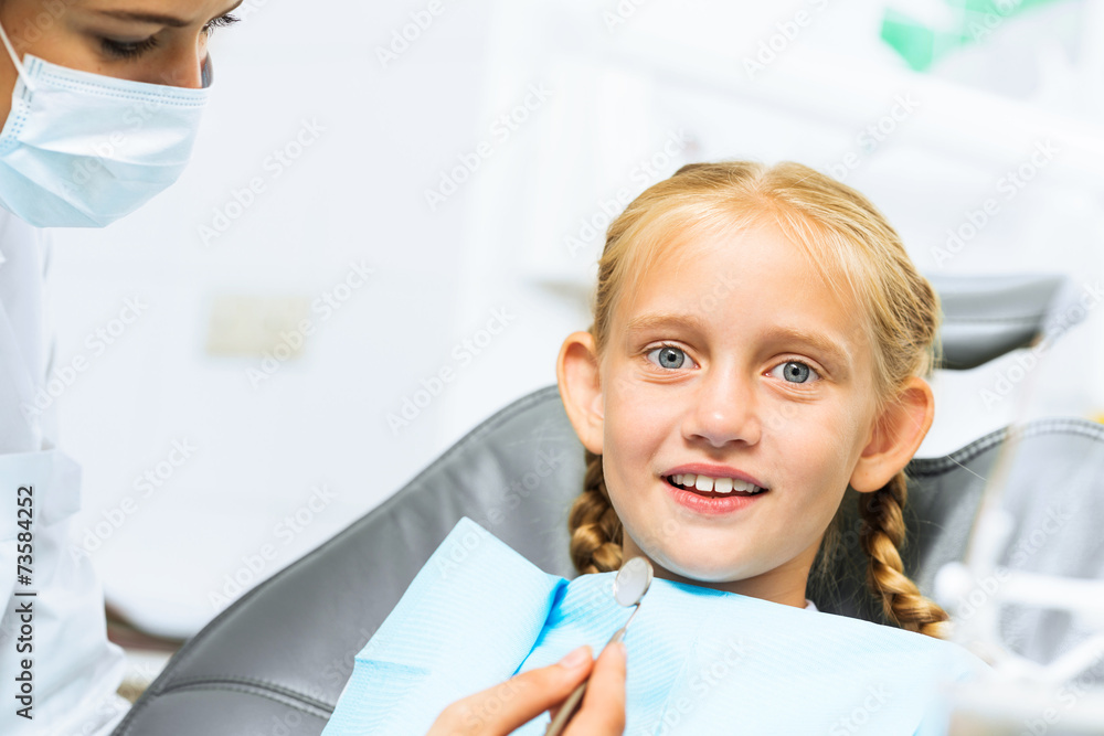 Fototapeta premium Dentist inspecting patient