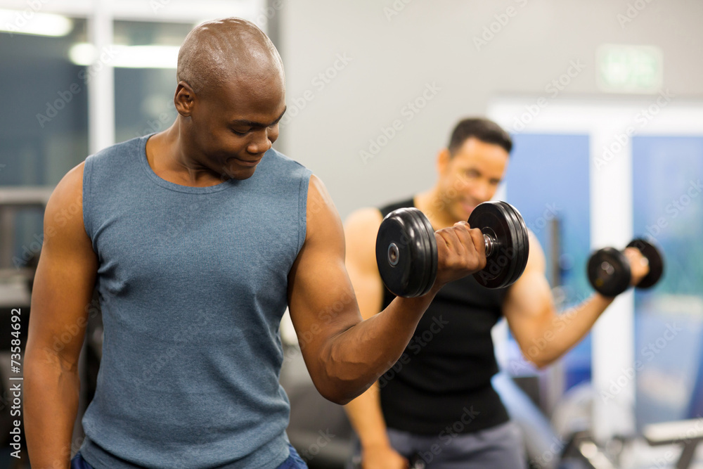 african american athlete lifting weights african american athlete lifting weights