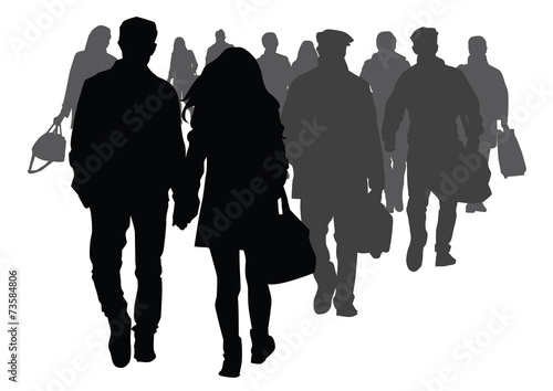 Silhouettes of people walking on the street