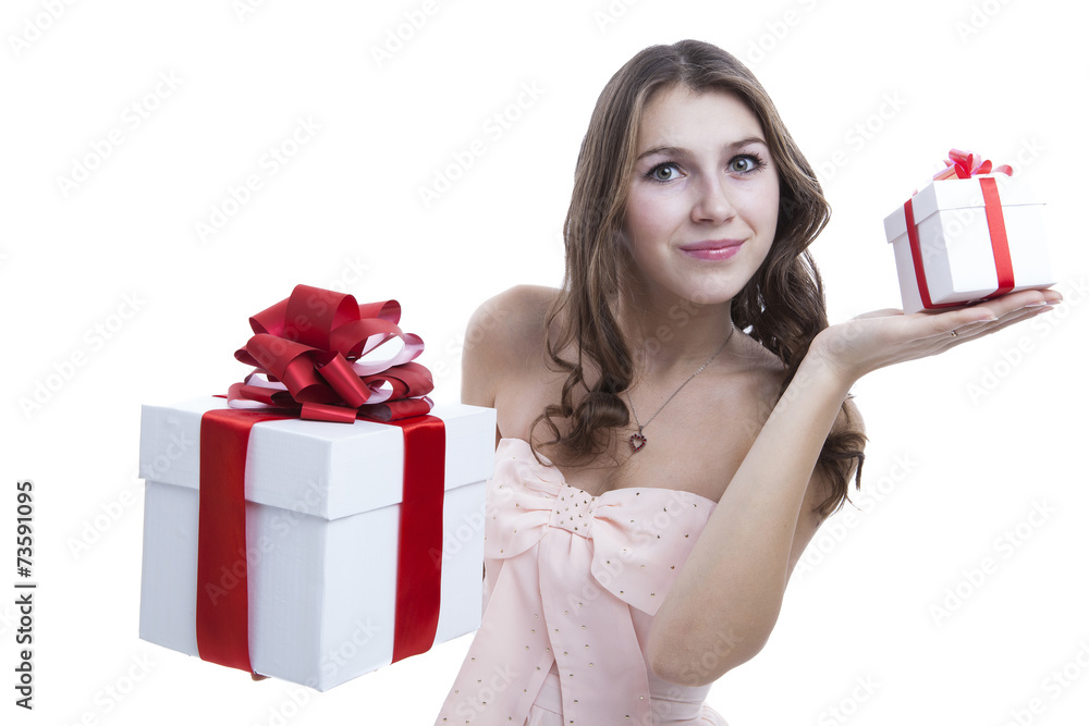 girl in a pink dress holding a gift box