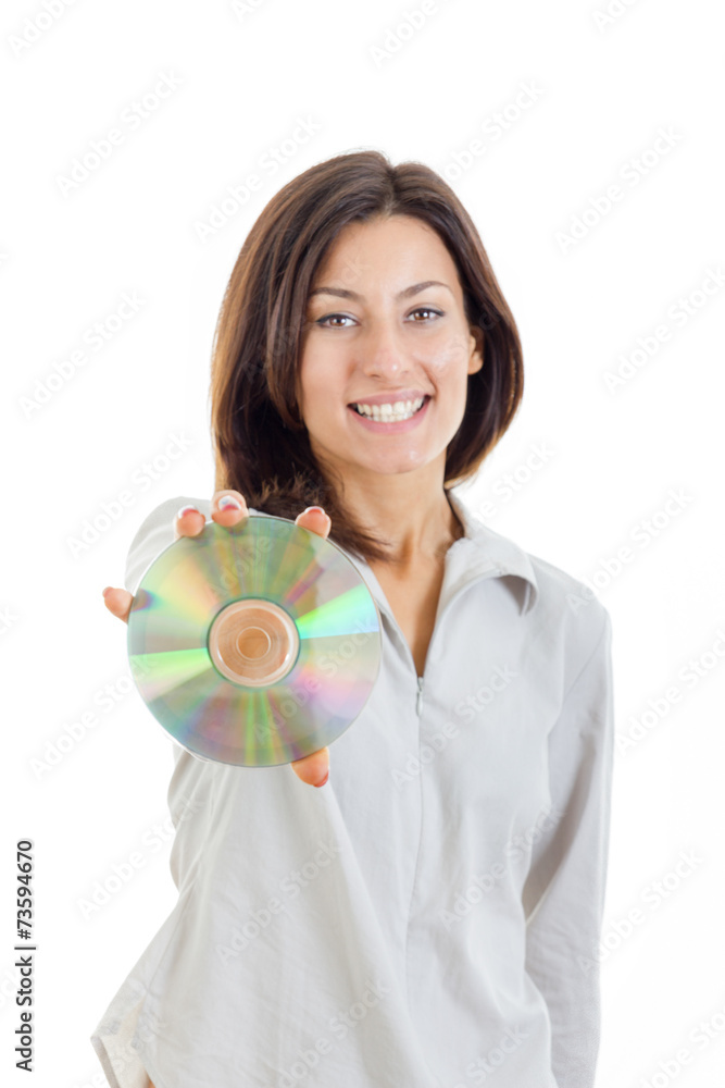 caucasian casual smiling woman holding up compact disc or cd and caucasian casual smiling woman holding up compact disc or cd and