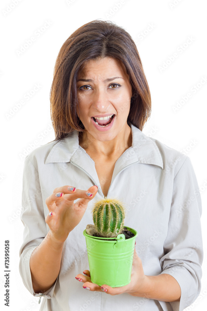 woman holding cactus plant and stabbed her finger with painful f woman holding cactus plant and stabbed her finger with painful f