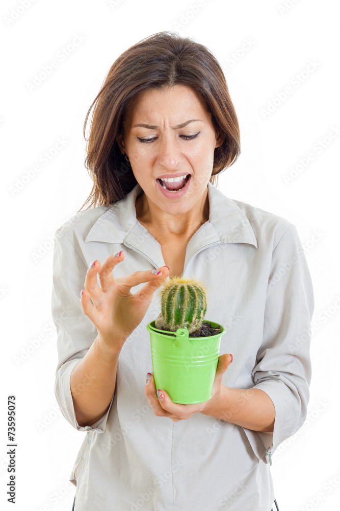 woman holding cactus plant and stabbed her finger with painful f woman holding cactus plant and stabbed her finger with painful f