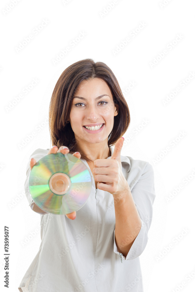 woman holding up compact disc or cd and looking at camera with t woman holding up compact disc or cd and looking at camera with t
