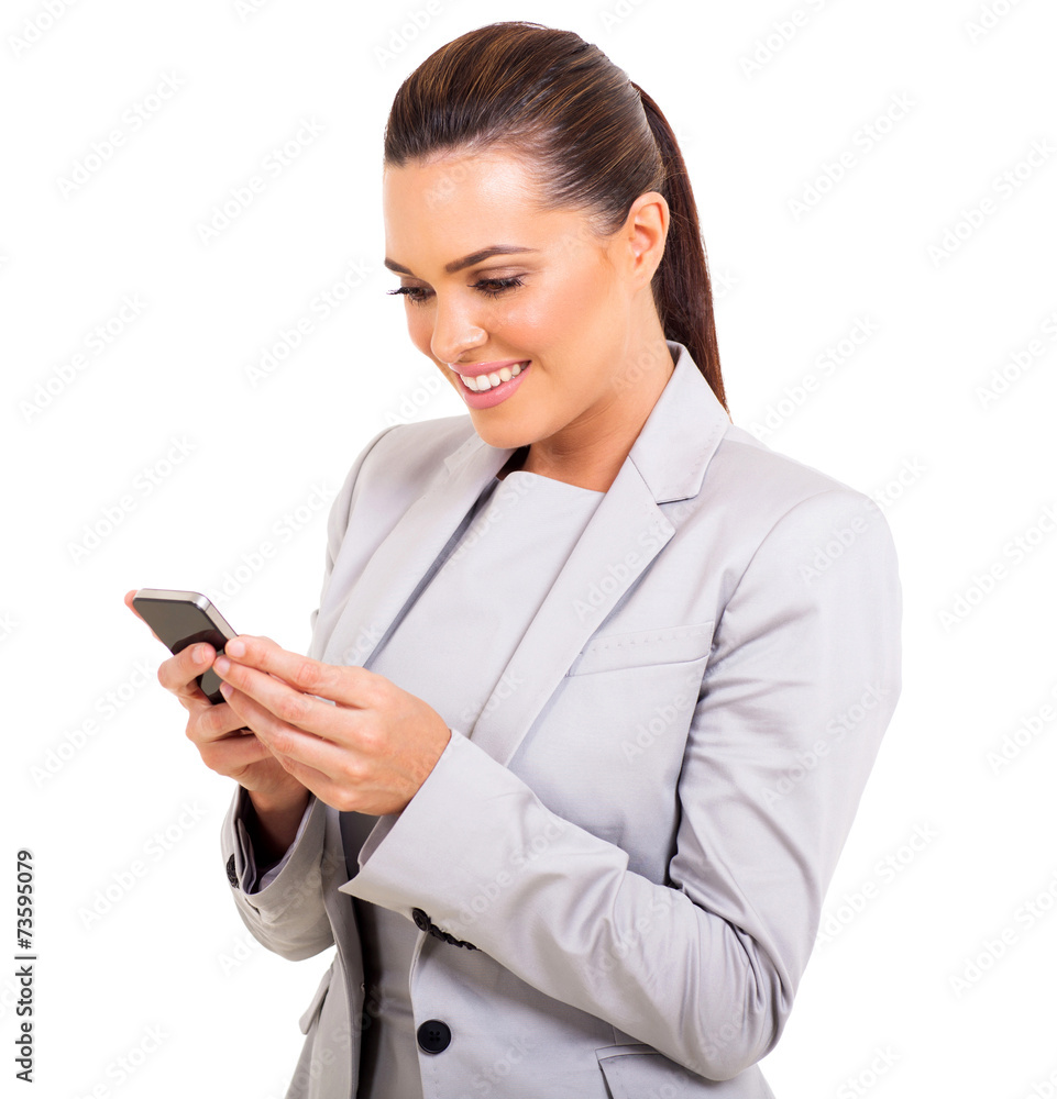 businesswoman texting on her smart phone businesswoman texting on her smart phone