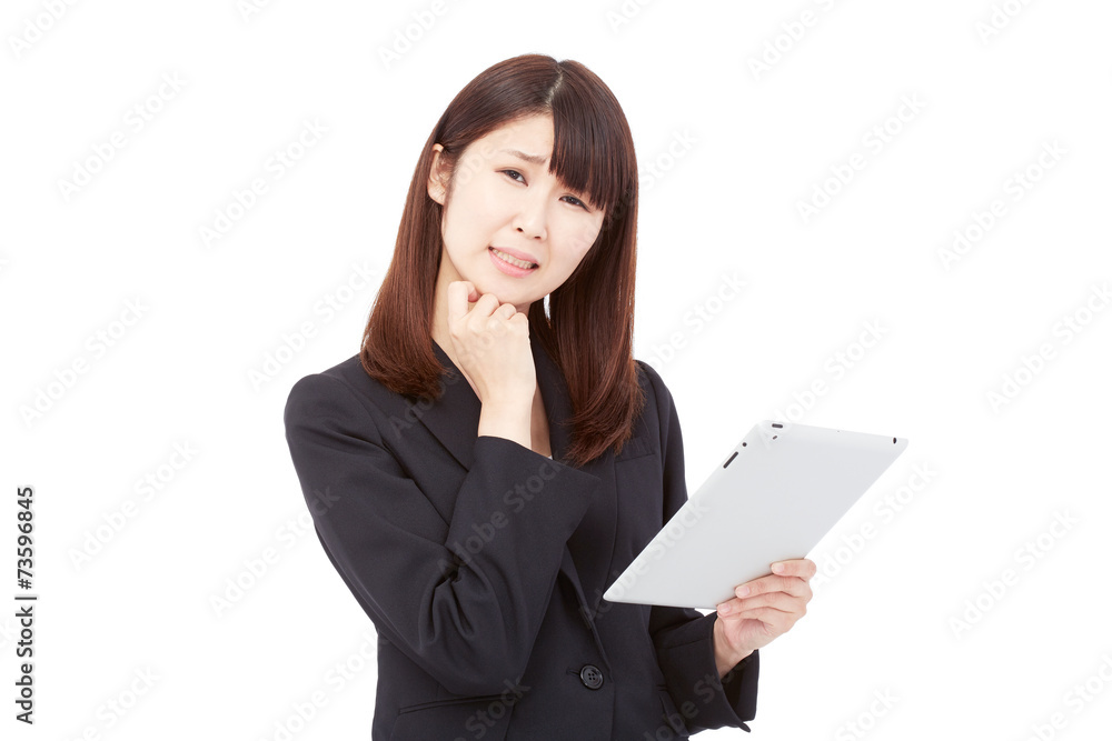 タブレットを持って困るビジネスウーマン タブレットを持って困るビジネスウーマン