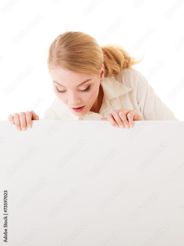 Businesswoman hiding behind blank copy space banner Businesswoman hiding behind blank copy space banner