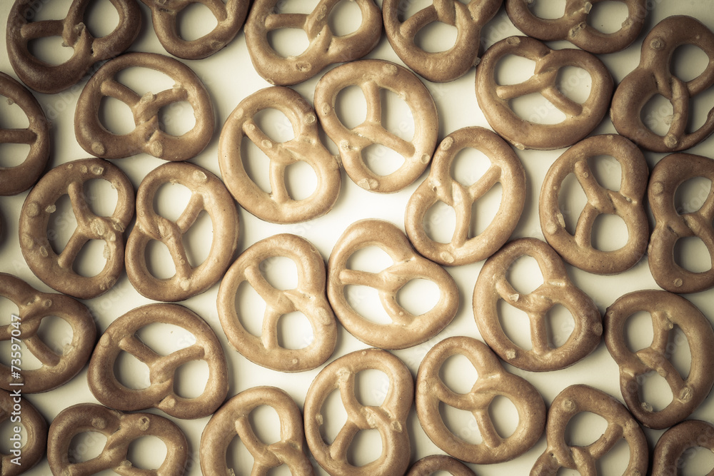 Salted pretzels on white as food background Salted pretzels on white as food background