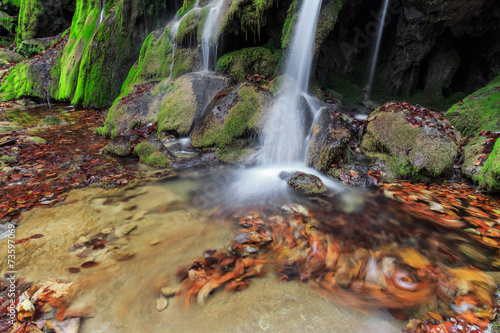  Beautiful waterfalls and autumn foliage in the forest