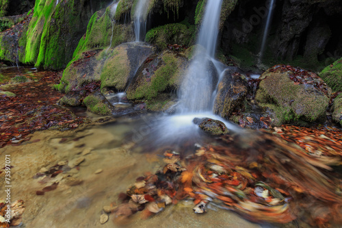 Beautiful waterfalls and autumn foliage in the forest
