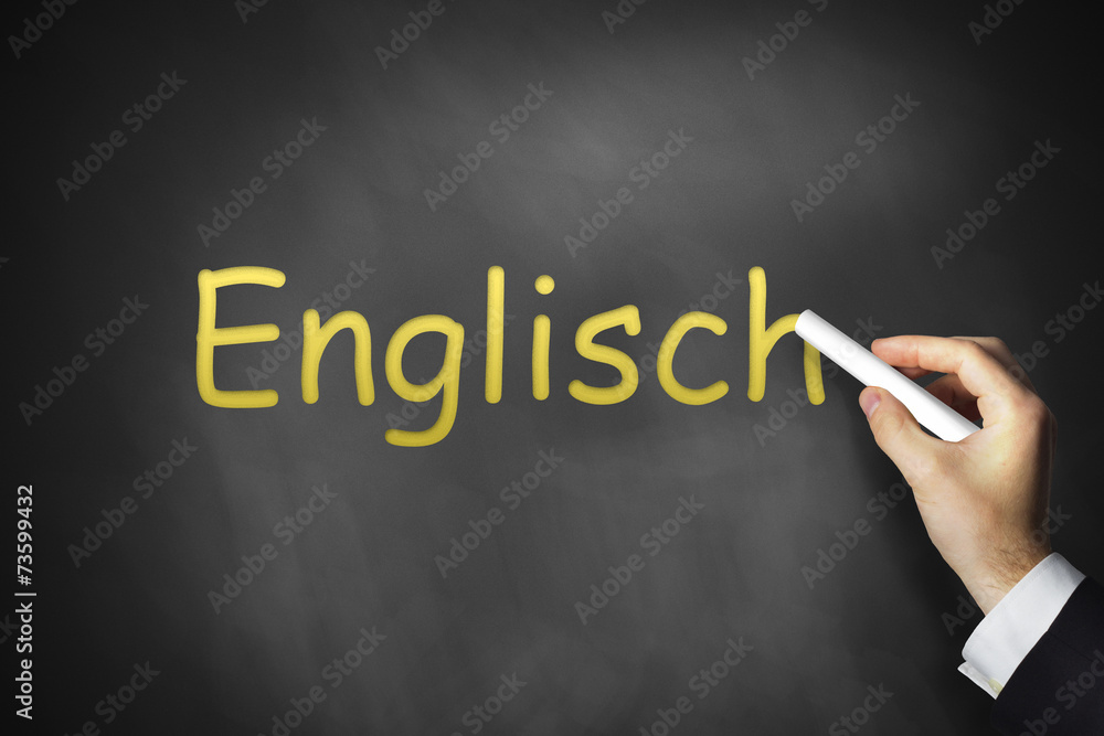 Hand schreibt Englisch auf Tafel Hand schreibt Englisch auf Tafel