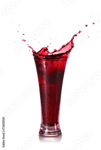 Red Juice Splash in A Glass