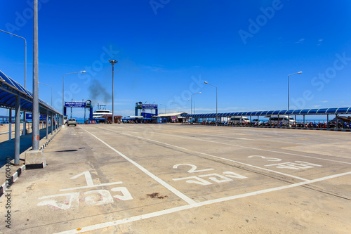 SURATTHANI - JULY 16   A long ferry concrete pier. The main pier