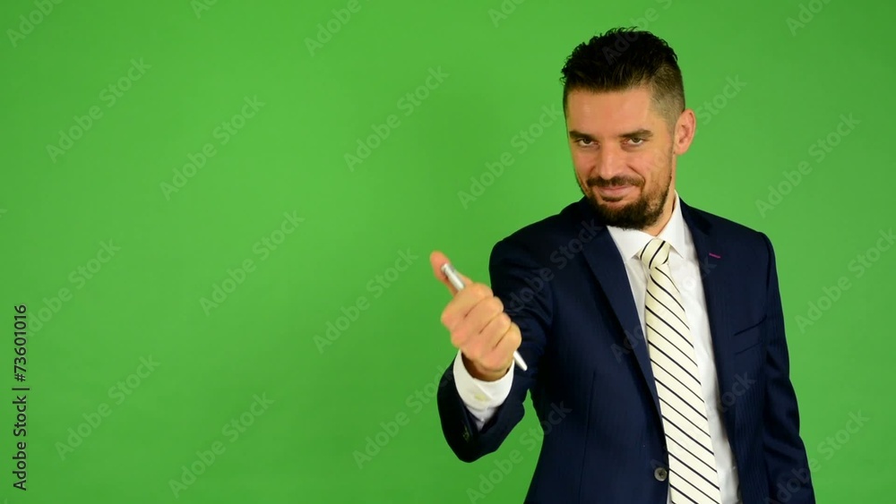 business man with pen (signature) - green screen - studio business man with pen (signature) - green screen - studio