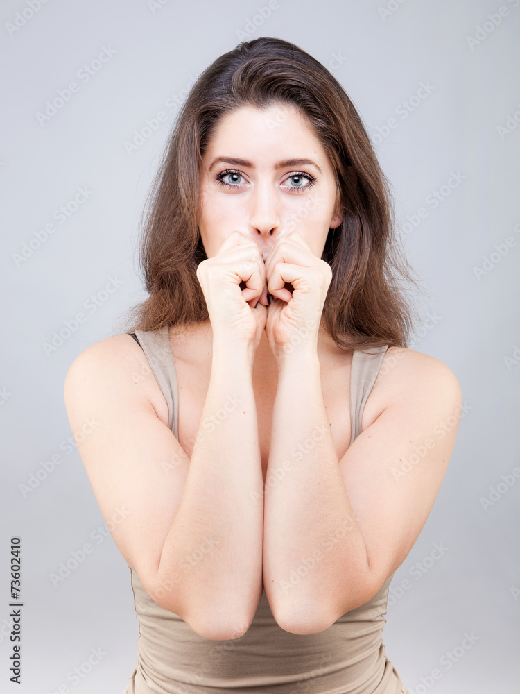 Beautiful young caucasian woman doing face yoga pose Beautiful young caucasian woman doing face yoga pose