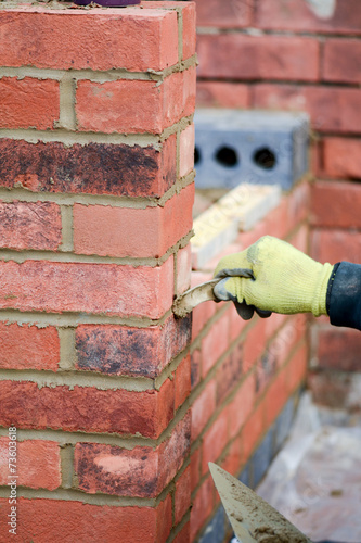 Billede på lærred Bricklaying - pointing work