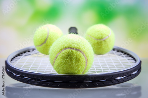 A set of tennis. Racket and ball.