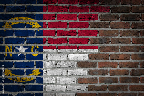 Brick wall texture with flag