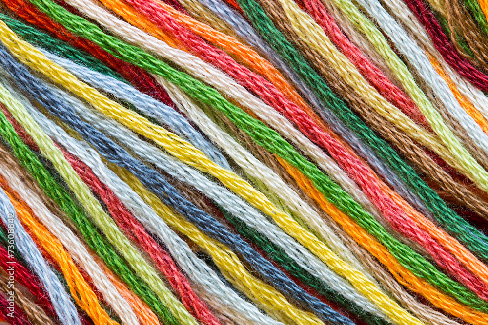 Multicolor sewing threads texture. Diagonal.
