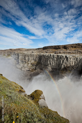 Dettifoss Waterfall in Iceland under a blue summer sky