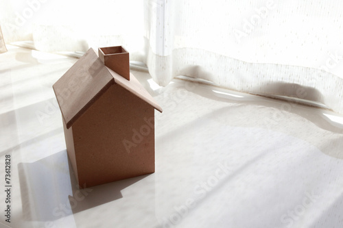 small wooden house in the morning with white curtain