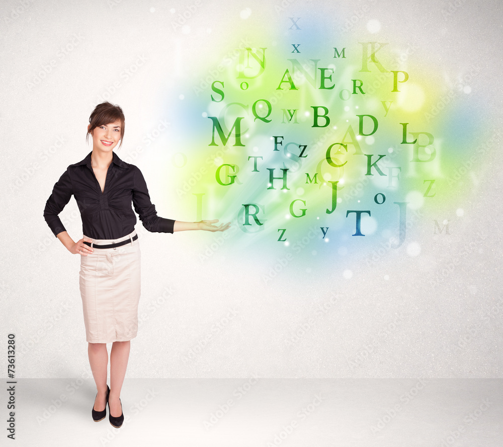 Business women with glowing letter concept Business women with glowing letter concept