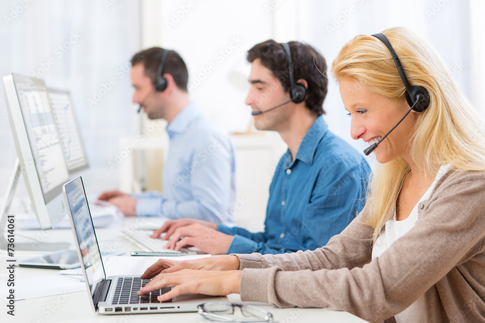 Young attractive woman working in a call center Young attractive woman working in a call center