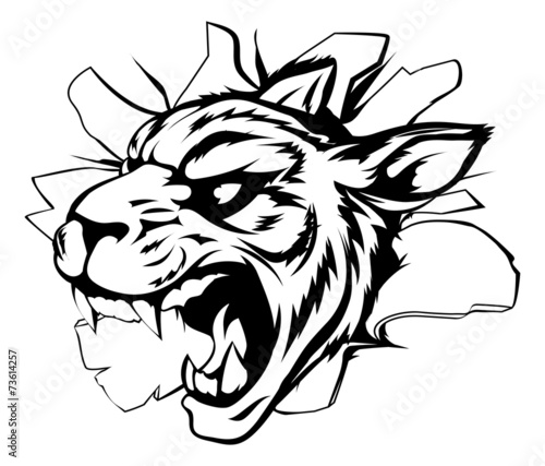 Fototapeta Naklejka Na Ścianę i Meble -  Tiger mascot breaking through wall