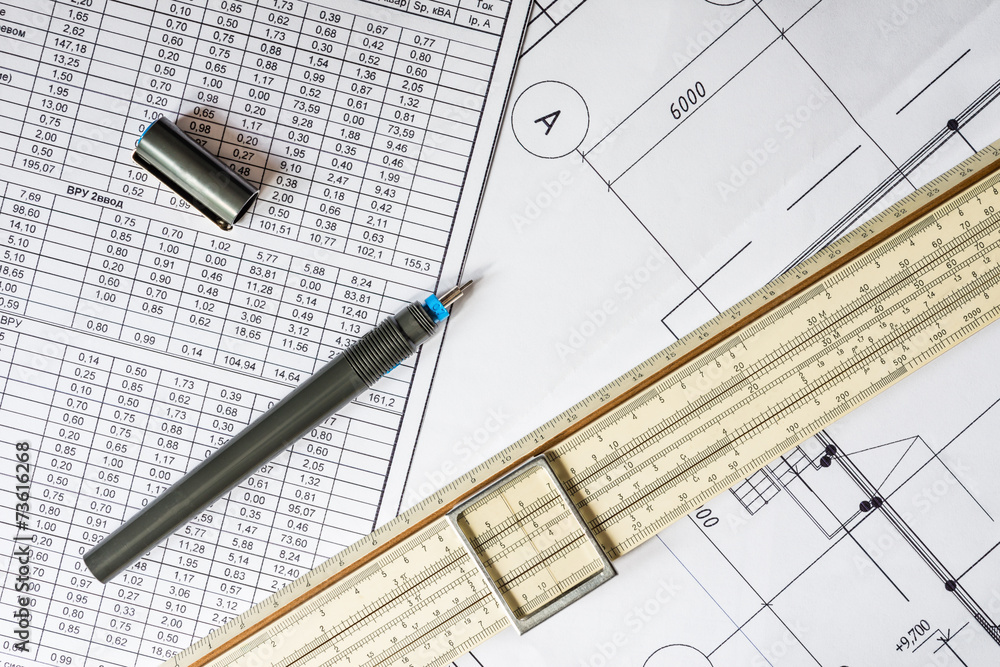 Drawing house plan, slide rule and pencil on the table Drawing house plan, slide rule and pencil on the table