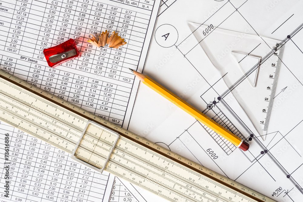 Architectural drawings, tools for sketching on the table Architectural drawings, tools for sketching on the table