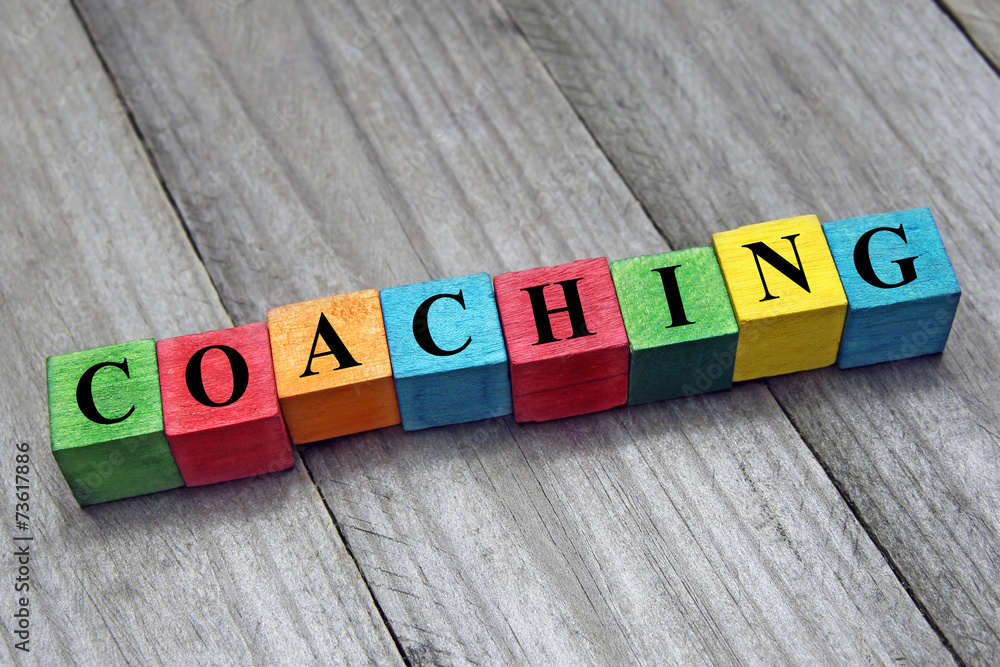 concept of coaching word on wooden colorful cubes - obrazy, fototapety, plakaty 