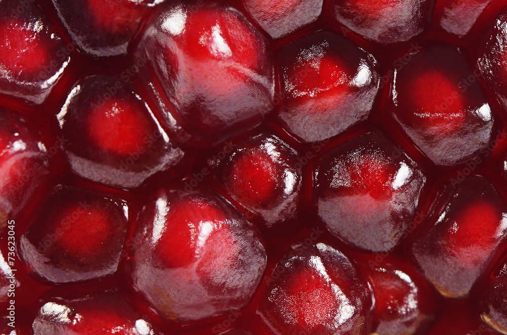 The fresh pomegranate as a background The fresh pomegranate as a background