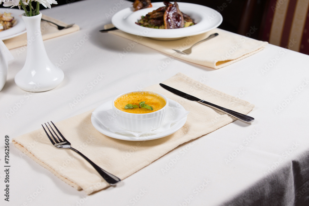 Bowl of tasty autumn pumpkin soup Bowl of tasty autumn pumpkin soup