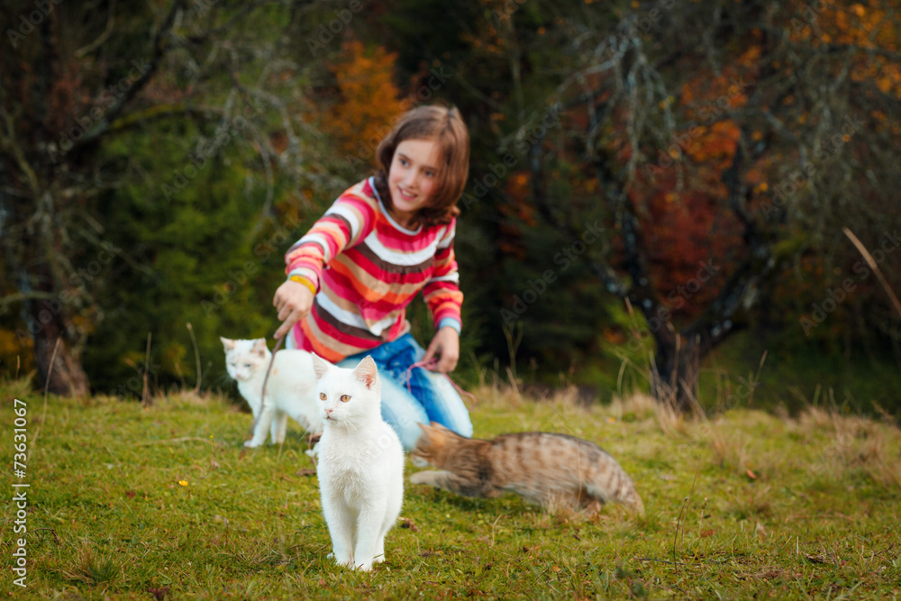 Girl and kittens