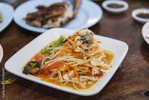 spicy papaya salad with salted crab and fermented fish