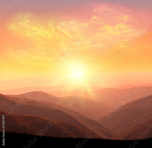 Wallpaper Mural sunrise in the mountains