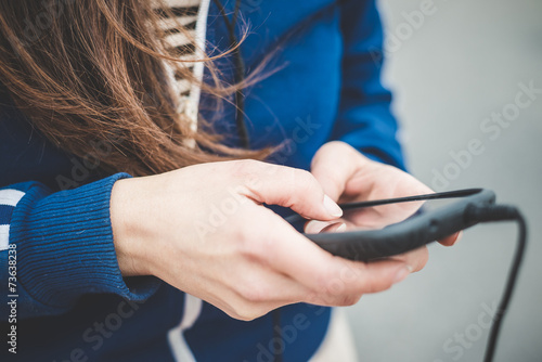 close up of woman hands using smart phone