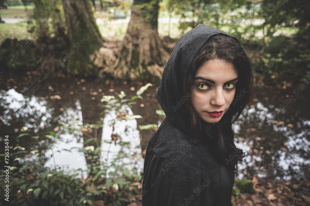 beautiful dark vampire woman with black mantle and hood beautiful dark vampire woman with black mantle and hood