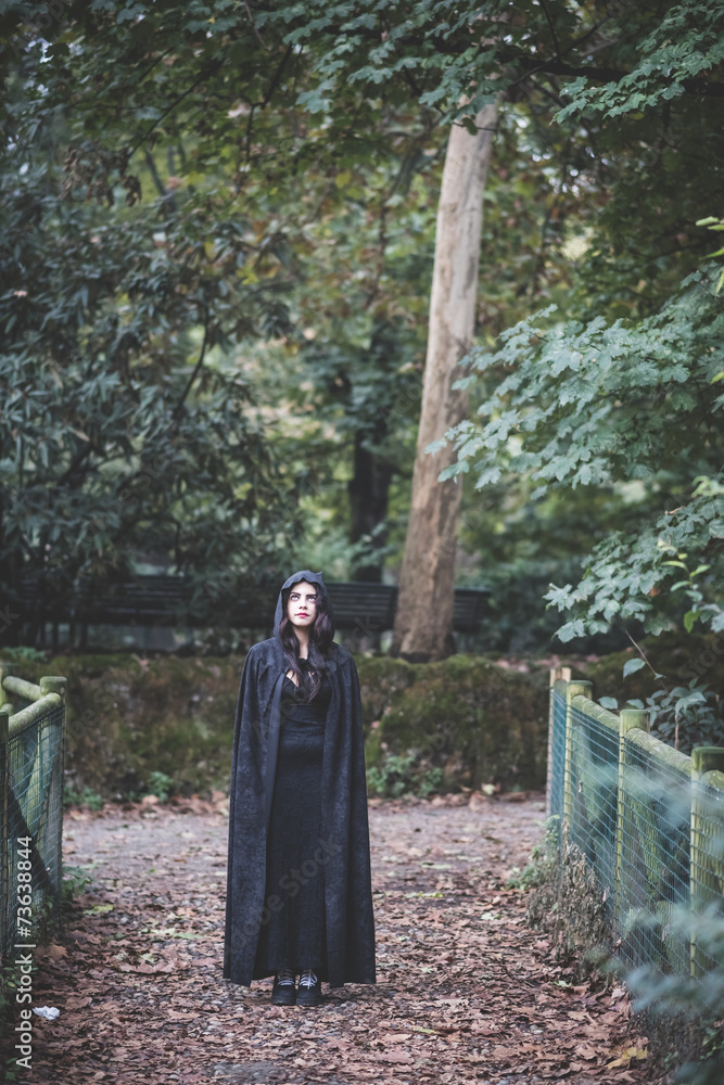 beautiful dark vampire woman with black mantle and hood beautiful dark vampire woman with black mantle and hood