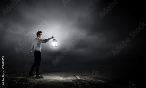 Man with lantern