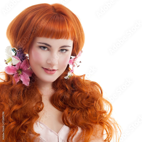 Beautiful red hair woman with long hair.