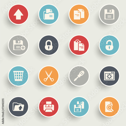 Document icons with color buttons on gray background.